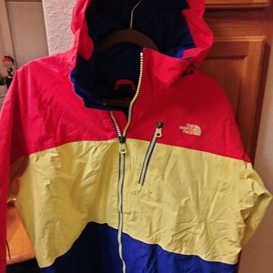 The North Face jacket sizeXL. Blue yellow and pink very bright colors